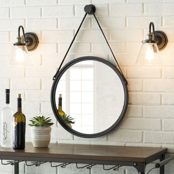 round mirrors on rope